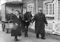 Brother and sister Charlie and May Tully on their grocery round